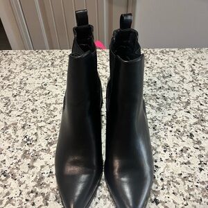 Sleek Black Chelsea Ankle Boots with Pointed Toe